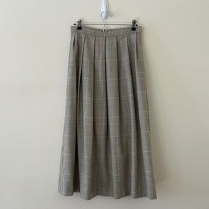 Skirt, pleated, 100% wool, side hook closure, two in-seam pockets, handmade.